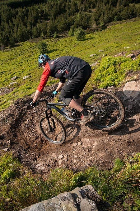 Technical downhill corner for endure rider Charles